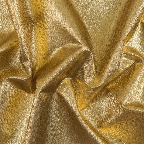 shiny metalic fabric|fabric with gold metallic threads.